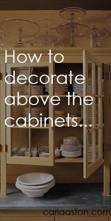 Have you ever thought what to do with free space on cabinets or you just put things up? Find out how to decorate above cabinets and how not to in this post.