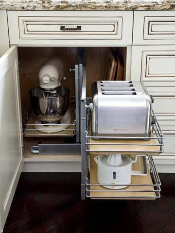 To make your kitchen look neat and clean it is good to keep small appliances out of sight but in order so that you can easily reach them.