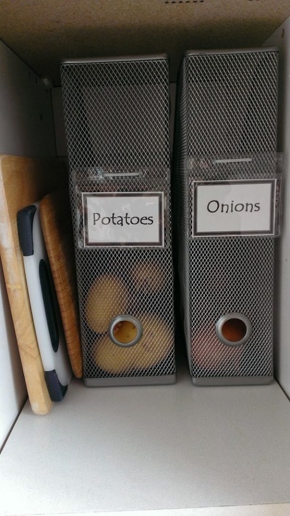 Use-magazine-holders-to-keep-your-onions-and-potatoes